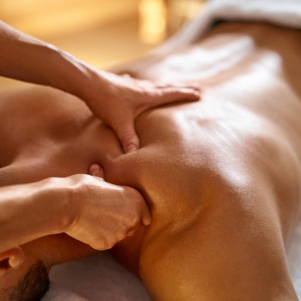 Close-up of a man getting  massage